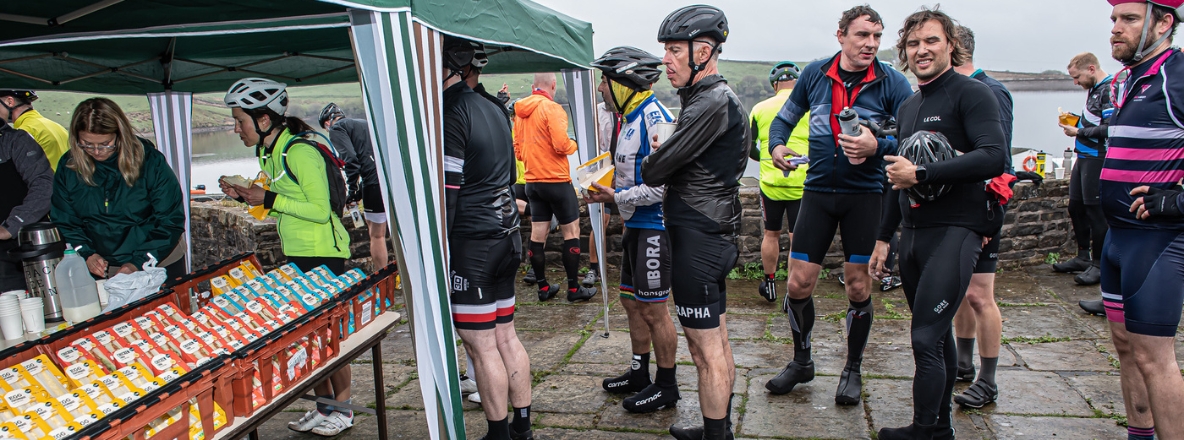 cyclists enjoying sandwiches